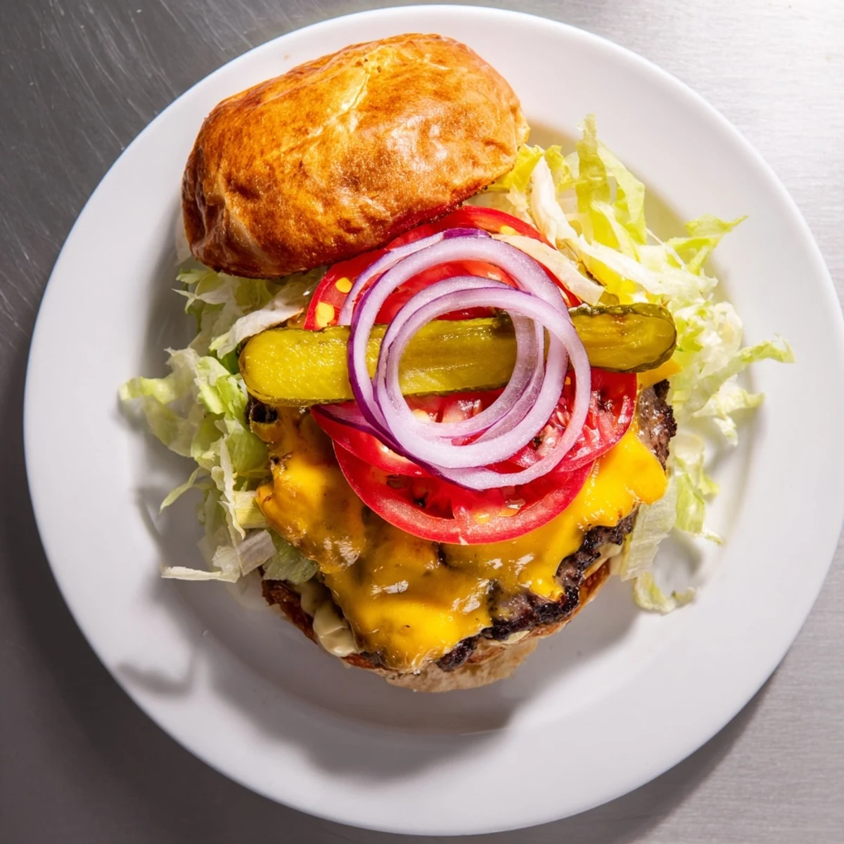 Juicy beef smash burger patty topped with fresh lettuce tomato and red onion