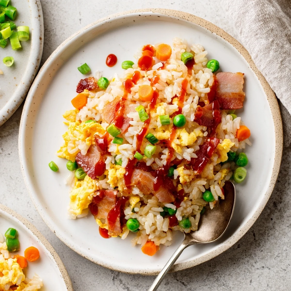 Comforting Breakfast Fried Rice served hot with green onions and sesame