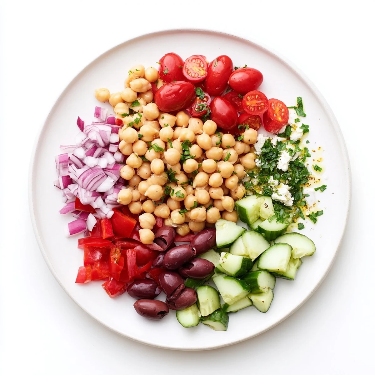 Vibrant Mediterranean Chickpea Delight with zesty lemon herb dressing and crisp cucumber