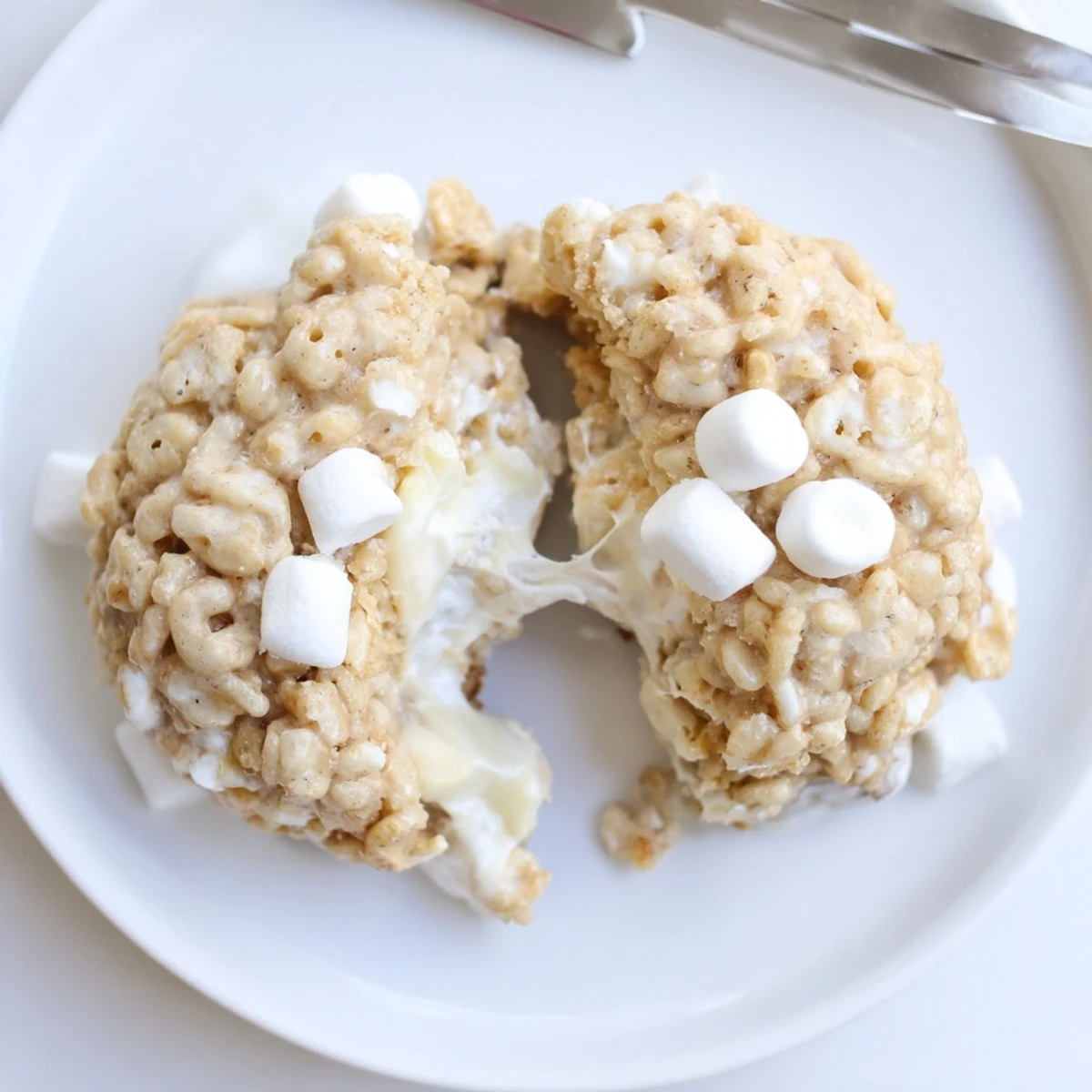 Warm Rice Krispie Treat Cookies cooling on rack, crispy cereal bits and melty chocolate