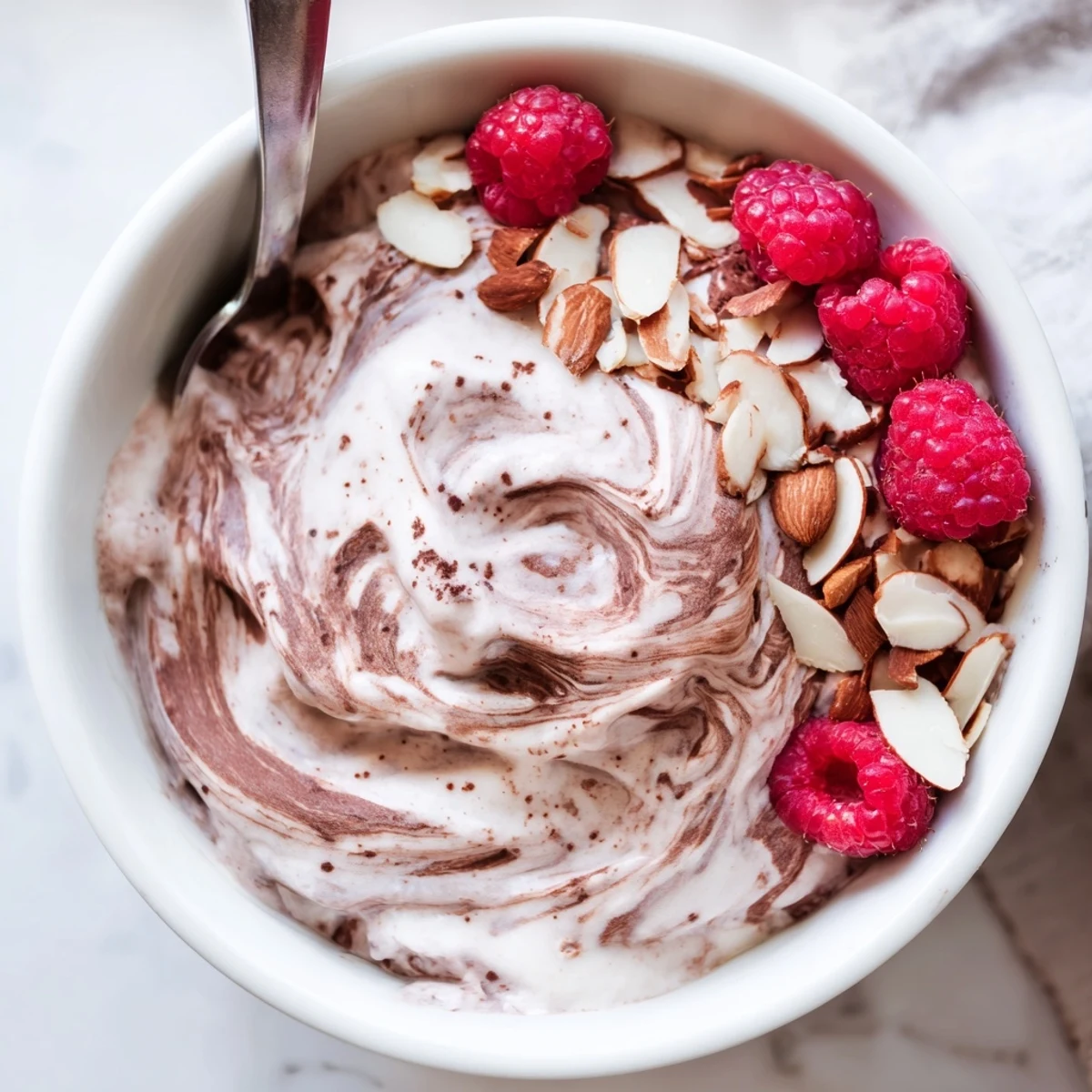 Vibrant healthy nice cream recipe scooped into glasses showcasing smooth dairy-free banana soft serve texture