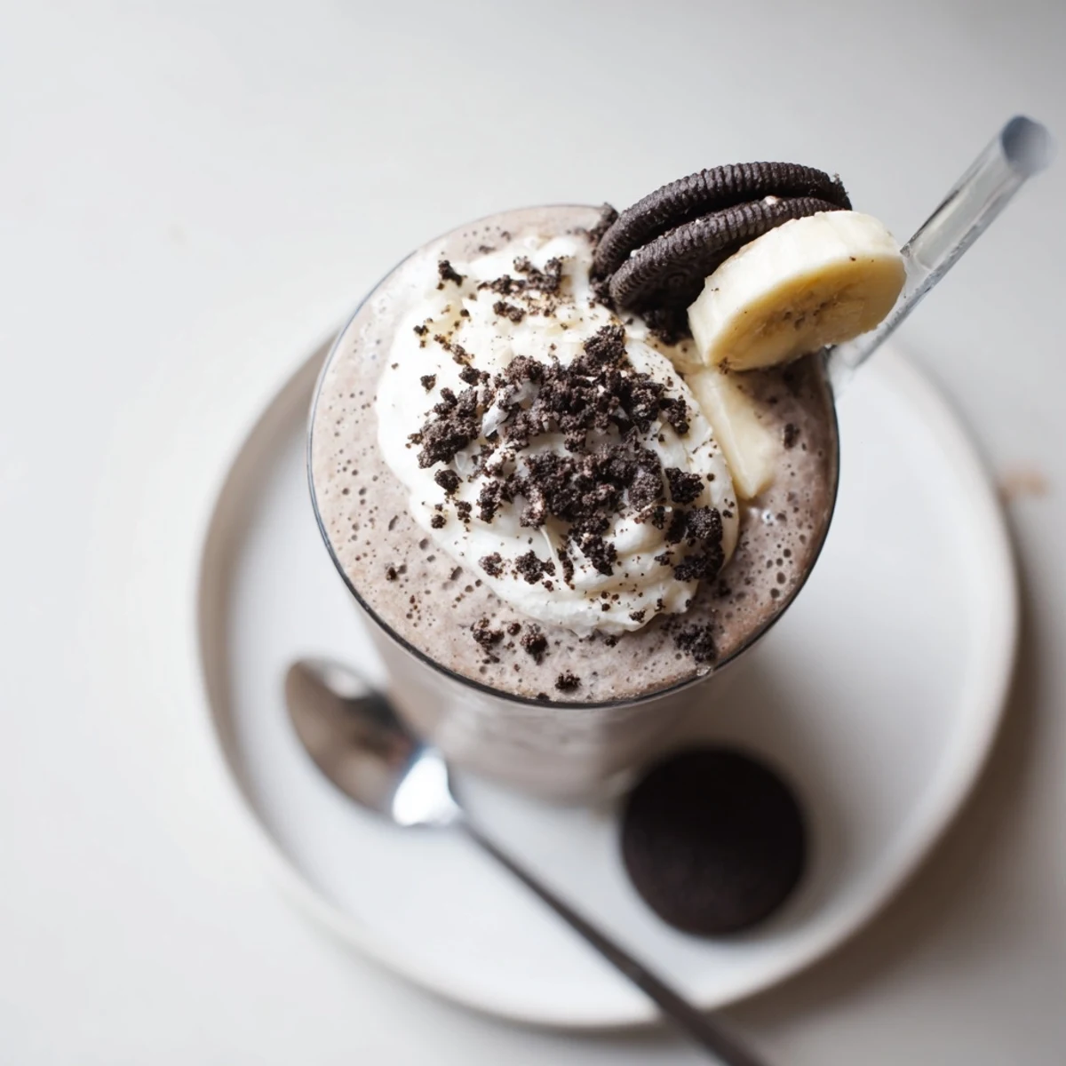 Post-workout Cookies And Cream Protein Shake with banana and ice, thick.