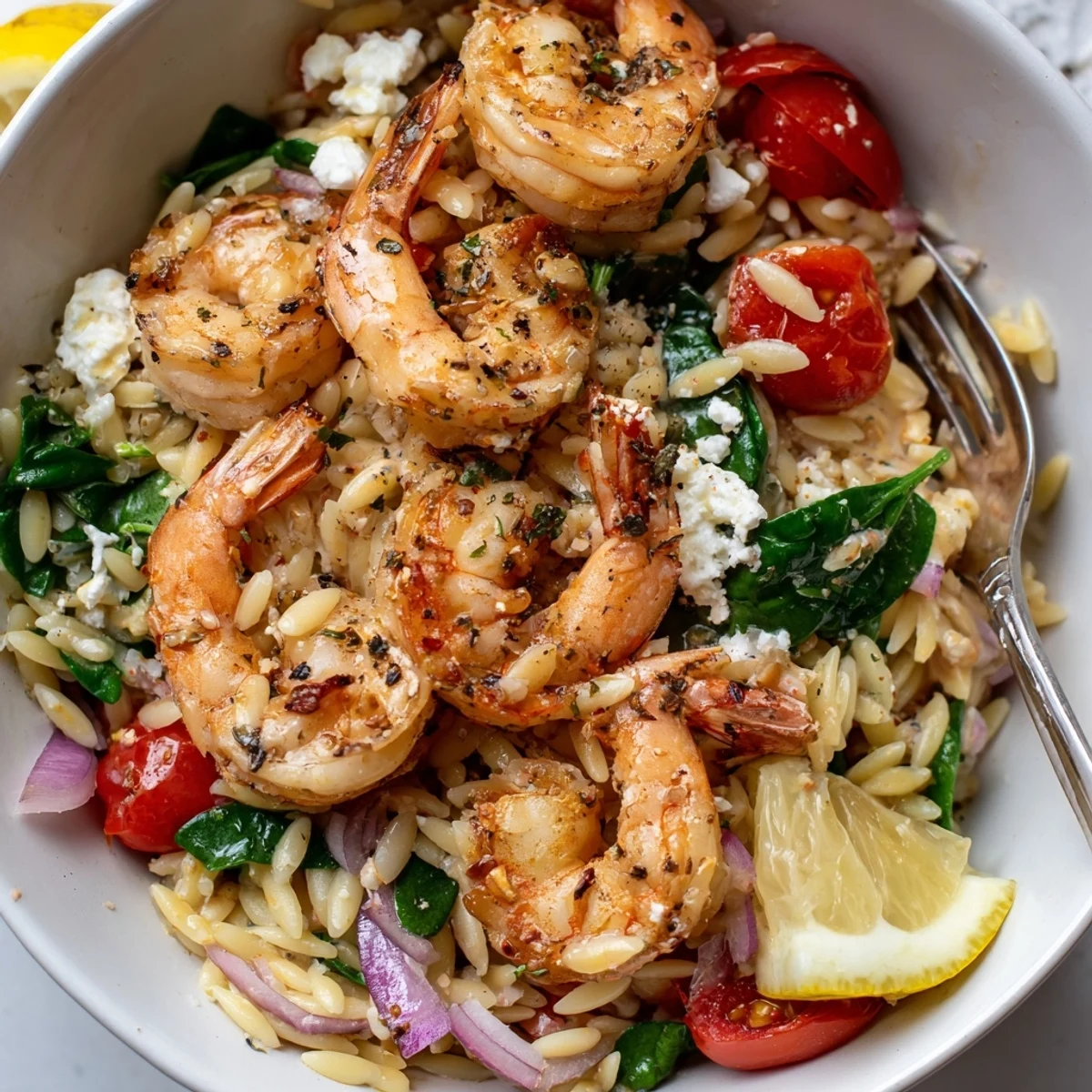 Weeknight Lemon Feta Orzo Shrimp Recipe tossed with creamy feta and lemon.