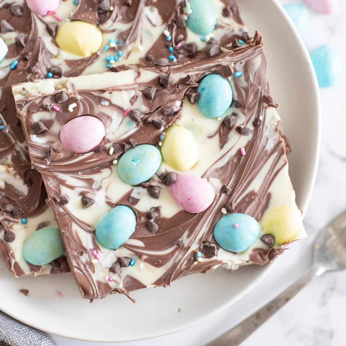 Homemade Robin Egg Easter Bark broken into pieces, sweet milky aroma wafting